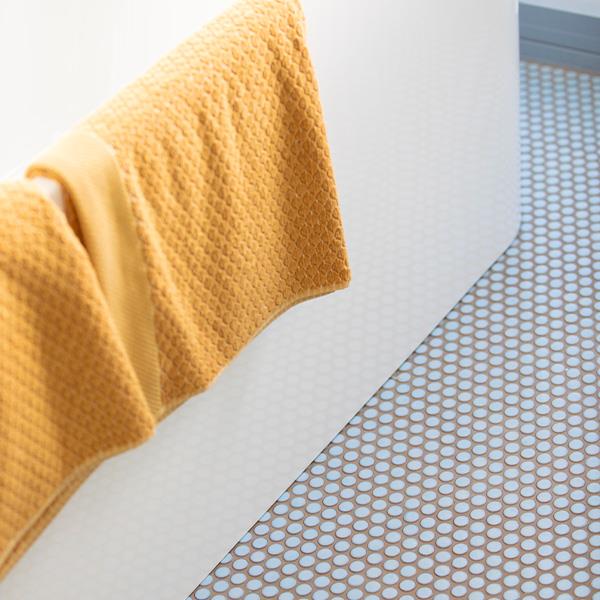 curved wooden staircase with lights